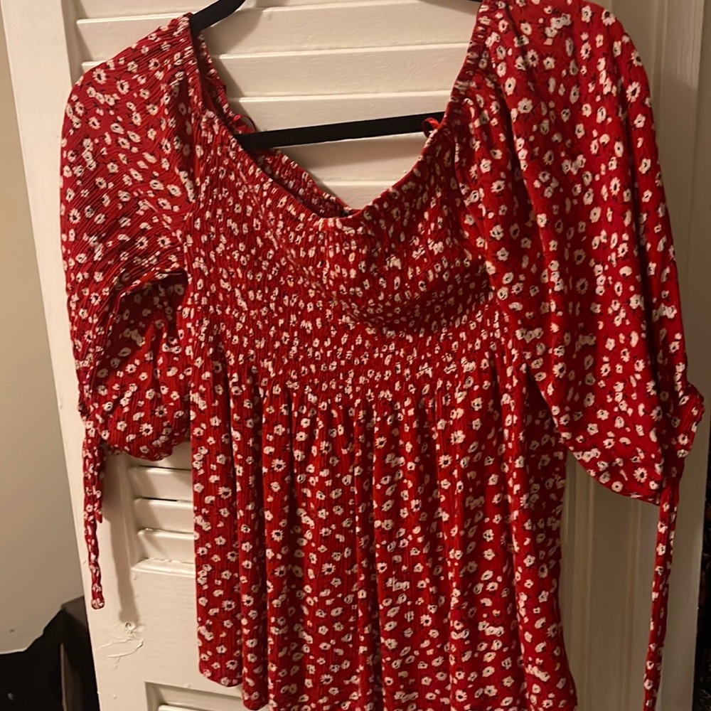 Red shirt white flowers